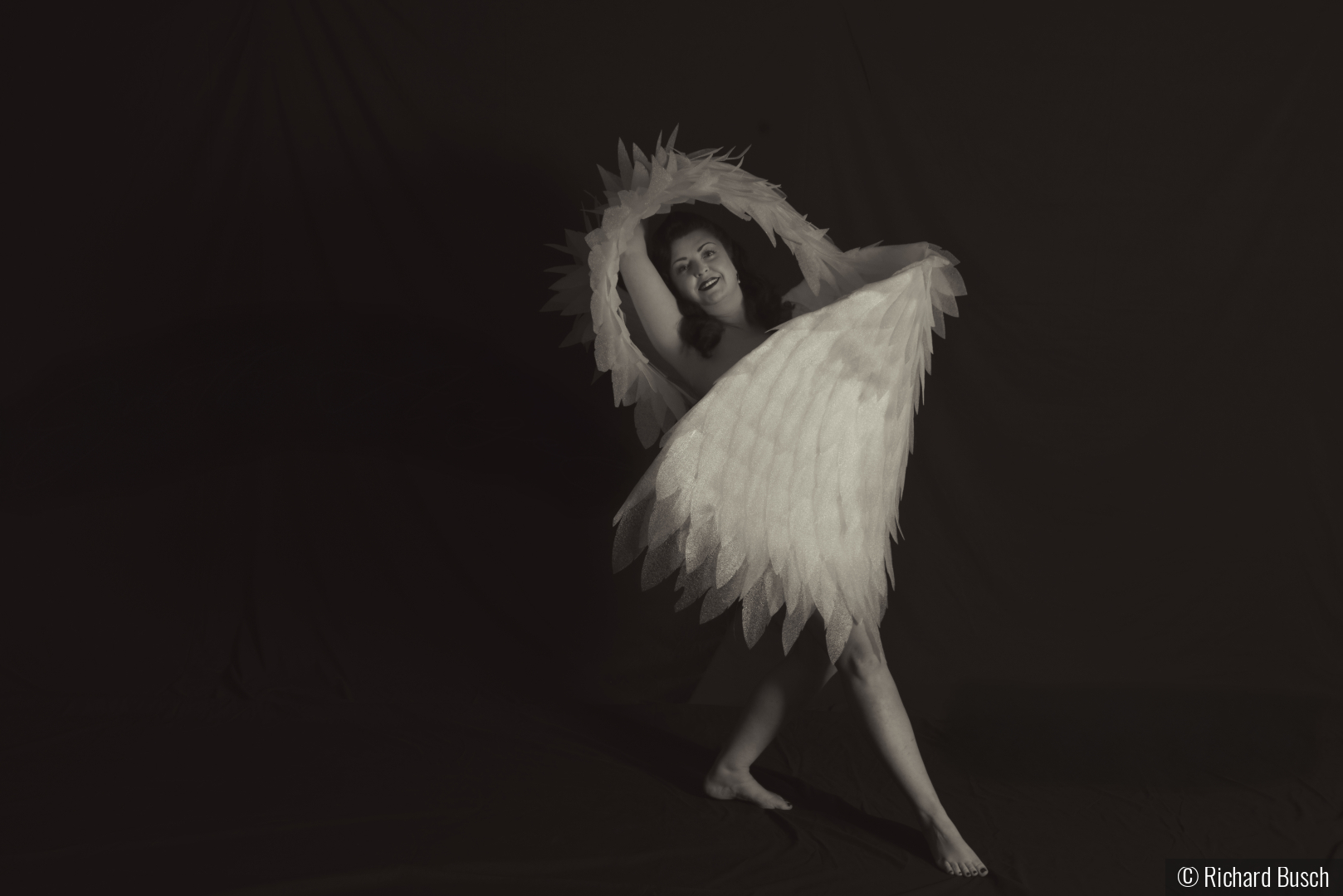 Angel moving into the light Natasha by Richard Busch