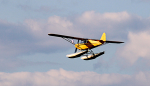 Float plane after takeoff - Photo by Chip Neumann