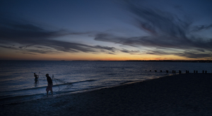 sunset fishermen - Photo by John Parisi